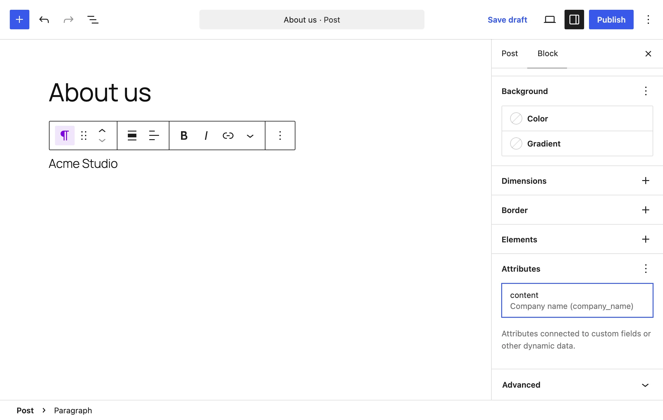 A paragraph in the block editor bound to the company name field in the Attributes panel